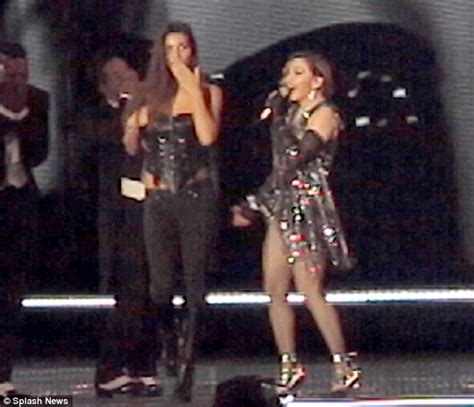 madonna shocks brisbane concert as she exposes fan s breast during rebel heart tour daily mail