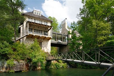 If you want to monetize your investment he can help you turn your lake house into a vacation rental and maximize the return on your investment. View from lake with living room spanning the waterfall ...