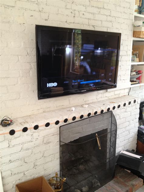 How To Hang Tv Above Brick Fireplace And Hide Wires Vanda Higginbotham