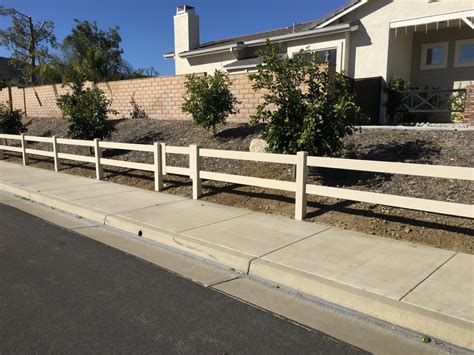 Bufftech allegheny molded vinyl fencing (formerly simtek ecostone) the the bufftech allegheny simulated stone fence has one full length panel with steel reinforced rails built into the panel. Two Rail Tan Vinyl Fence - Yelp