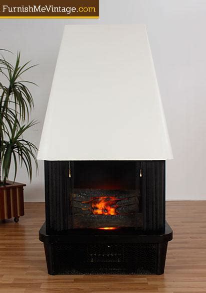 Modern fireplace tiles midcentury modern fireplace modern electric fireplace home fireplace fireplace remodel this mid century modern fireplace is truly an inspiration for anyone. Mid century modern white electric fireplace with heater