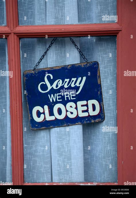 Old Sorry We Are Closed Shop Sign In Window Stock Photo Alamy