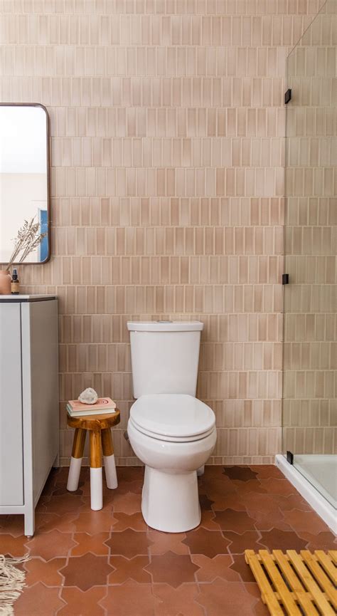 If the height of the basement ceiling is low, beadboard can give it visual expanse. Floor to ceiling tile in this beautiful basement bath ...