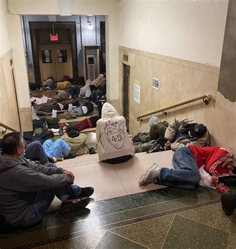 shocking footage shows dozens of homeless men forced to sleep on the floor of a shelter that