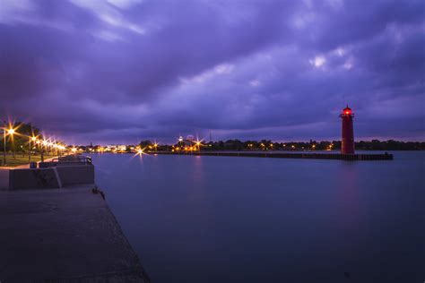 Lighthouse And City Lights Olsonj Flickr