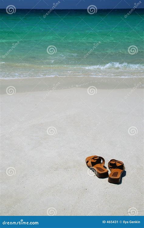 thongs on the beach stock image 1639387