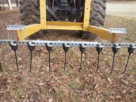 Most lawn tractor manufacturers provide optional bagger attachments. 355272-home-made-attachments-06-tractor-carry-all-rake ...