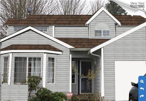 For a more edgy look, try a brighter yellow with a dark gray roof. This is a close example of our house's grey exterior with a dark brown roof... | Exterior paint ...