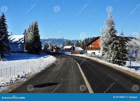 Winter Road With Snow Covered Spruces In The Mountains Stock Image