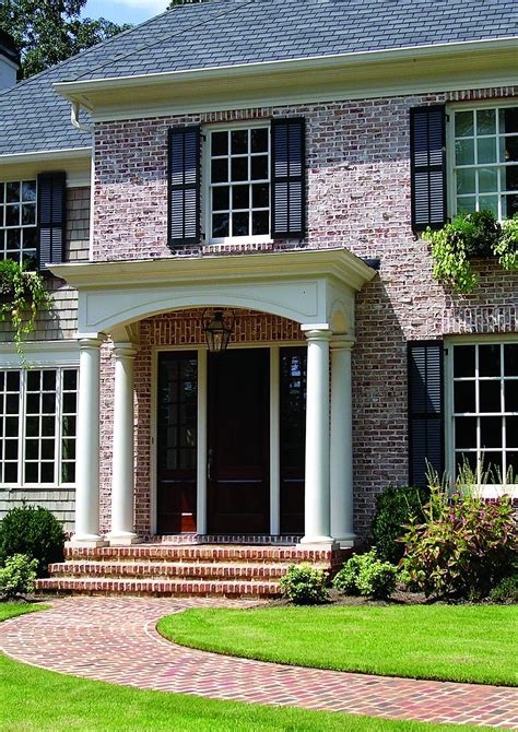 Front Porch House With Porch Portico Design Brick Pathway