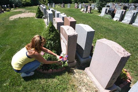 woman s job is to visit graves for loved ones who cannot the new york times