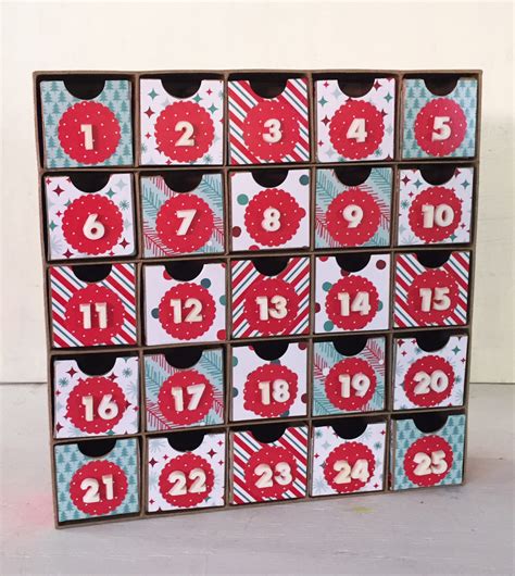 An advent or countdown calendar is the perfect way to anticipate the arrival of christmas. DIY Kids Christmas Countdown Calendar - Handmade Happy Hour