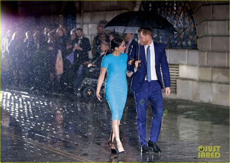 These Photos Of Meghan Markle And Prince Harry Walking In The Rain Look