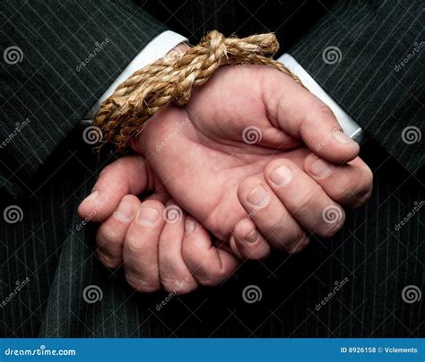 A Business Man With His Hands Tied Behind Hs Back Royalty Free Stock