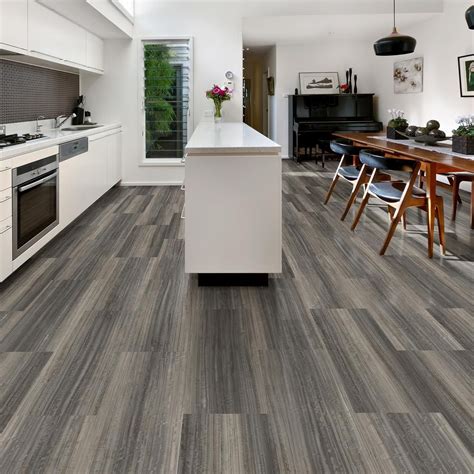 Expert advice on how to install laminate under a by installing the flooring first, you will also be able to more easily switch up cabinetry or fixtures, without having hi, i just purchased lifeproof from home depot for my master bathroom. Lifeproof Take Home Sample - Grey Wood Luxury Vinyl ...