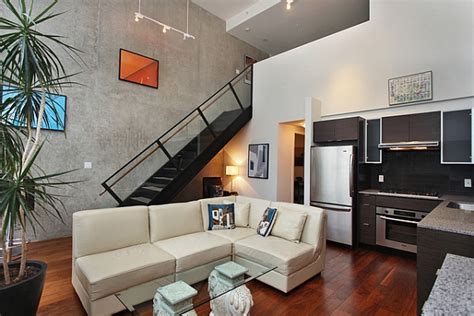 An industrial style loft apartment comprised of 130 square meters of living space was designed by interior designer lev lugovskoy, sited in moscow, russia. Industrial Loft Brings A Dash New York City Charm To ...