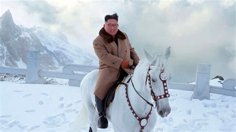 North Korean Leader Kim Jong Un Rides Horse In Mount Paektu Photos