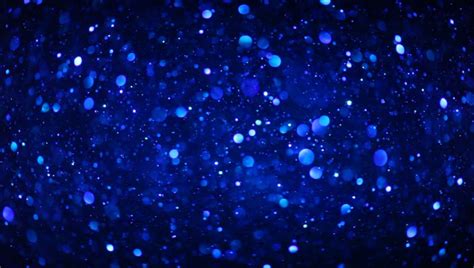 Blue Glitter Particles Falling In Light Rays Holiday Abstract Seamless