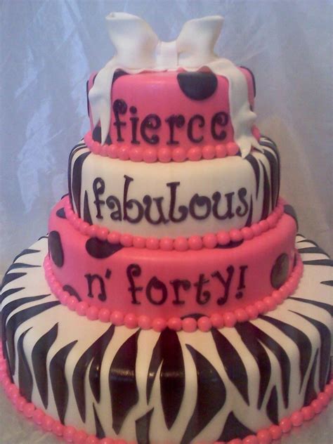 Three Tiered Cake Decorated With Zebra Print And Pink Frosting That Says Fierce Fabulous In Forty
