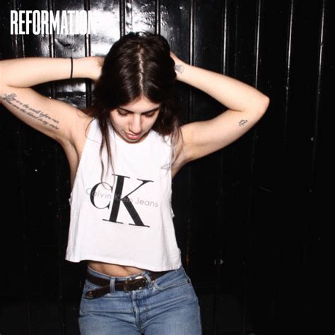 She Wears Hercalvins In The Reformation Booth T Shirts For Women Women How To Wear