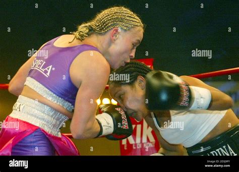 German Regina Halmich L Punches Dominican Republic S Johanna Pena Alvarez During A Wibf