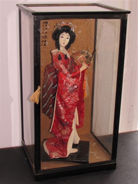 Lot Detail Collectible Vintage Japanese Nishi Doll Geisha Holding Samurai Helmet In Glass Case