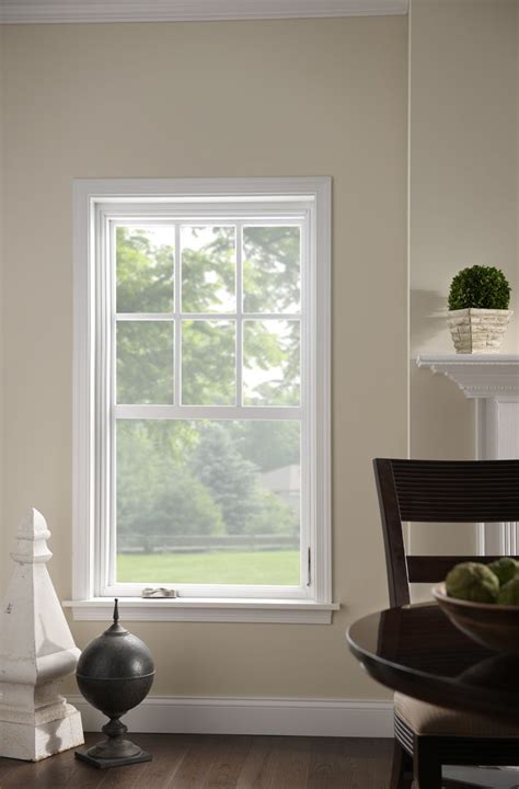 Single Hung Window With Grids Increase Natural Lighting Through A