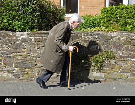 An Old Man Using A Walking Stick Stock Photo 35790260 Alamy