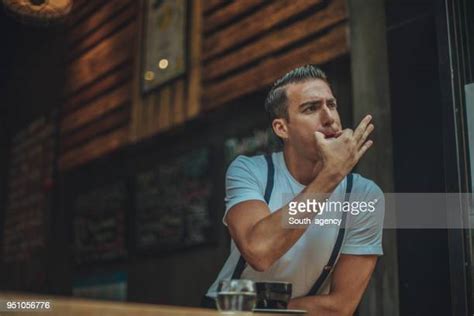 Man Whistling Photos And Premium High Res Pictures Getty Images
