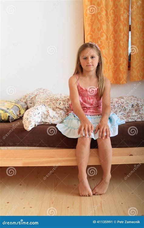 Girl Sitting On Bed Stock Photo Image 41135991 F0a