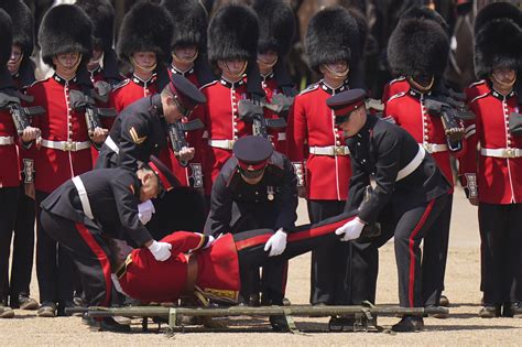 Several British Royal Guards Faint Due To Heat During Ceremony With