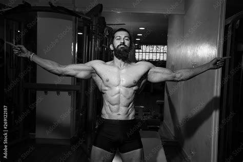 Strong Mans Posing In Gym Bodybuilder Muscular Men Copy Space