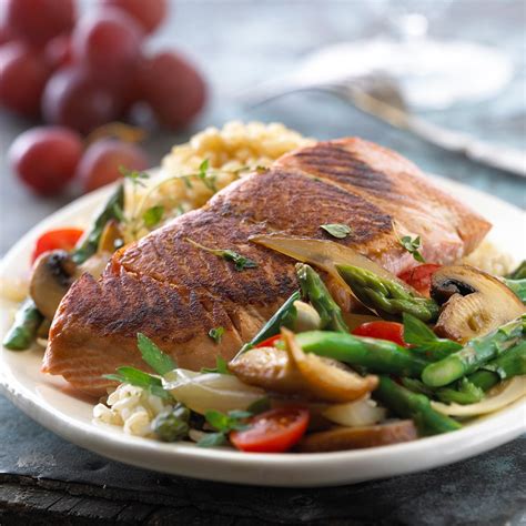 Combine spinach, salmon, asparagus, mushrooms, and carrot in a bowl; Salmon with Asparagus & Mushrooms Recipe - EatingWell