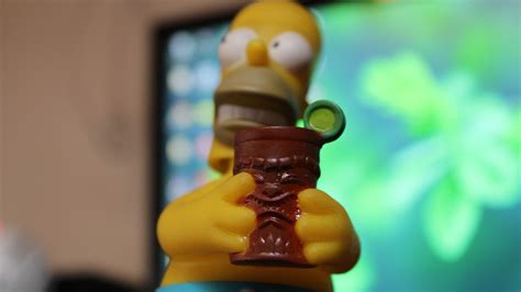Homer Simpson Plastic Toy Homer Simpson Macro Hd Wallpaper The Best