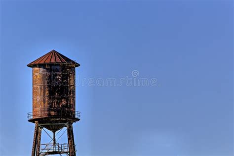 Old Rustic Water Tower With Blue Sky Background Stock Photo Image Of