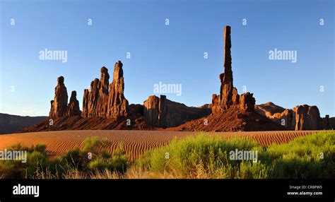 Totem Pole And Yei Bi Chei Rock Formations After Sunrise Monument