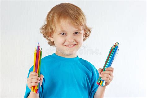 Young Blond Boy Holds Color Pencils Stock Photo Image Of Fantasy