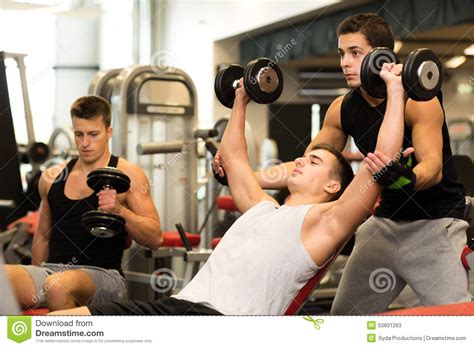 Group Of Men With Dumbbells In Gym Stock Image Image Of Healthy
