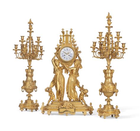 A French Ormolu Three Piece Clock Garniture By Lemerle Charpentier