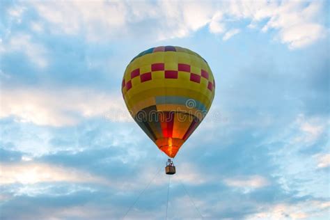 Hot Air Balloon In Flight With Blue Sky In Evening Time Editorial