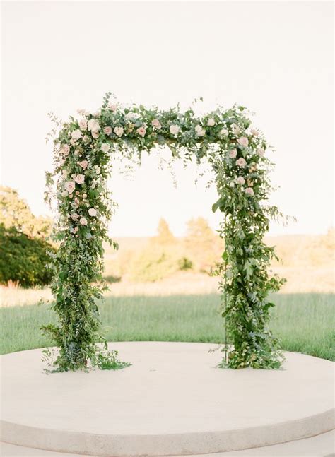 Consider layering in eucalyptus or pampas grass to further enhance the floral design of your wedding arbor. Wedding Ceremony Arbor/Arch with greenery and simple blush ...