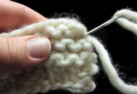 You can just eyeball this; How To Weave In Ends Invisibly On Garter Stitch | Knitting ...