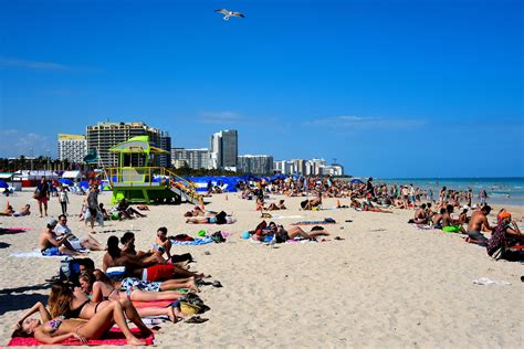 Crowds Sunning At South Beach In Miami Beach Florida Encircle Photos