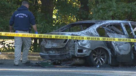 investigation of woman s body in burned car leads to apartment complex
