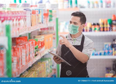 Male Shopkeeper Working In A Grocery Store Stock Image Image Of