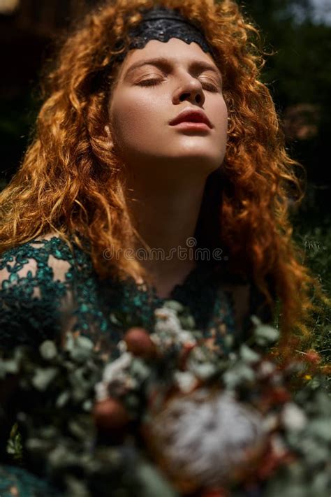 Close Up Portrait Of A Beautiful Redhead Girl Playing With Hair Stock