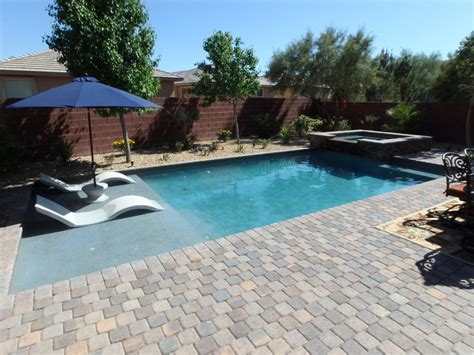 This pool designed and built by alderete pools of southern california features all the bells and whistles. Small Yard Rectangular Pool With Raised Spa Baja Deck ...