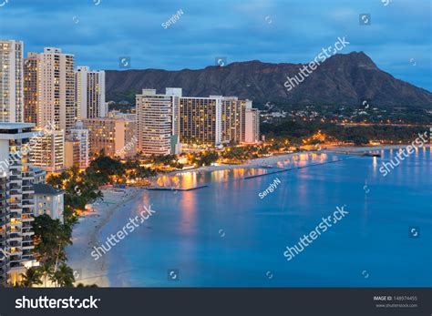 Scenic View Of Honolulu City Diamond Head And Waikiki Beach At Night
