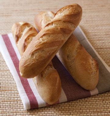 Pétrir à nouveau la pâte 2. Baguettes de pain maison - Recettes de cuisine Ôdélices