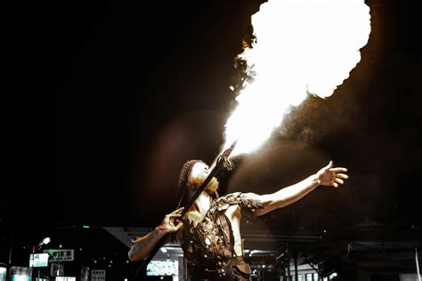 Man Spitting Fire At Nighttime · Free Stock Photo